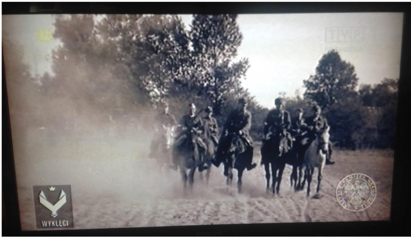 Fig. 1. Frozen frame from the educational programming Historia dla ciebie -pamięć pl. (TVP1) On the screen, in the right bottom the sign of IPN is visible, and in the left bottom – the symbol of accursed soldiers is presented.
